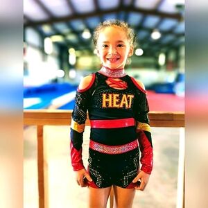 Gk child medium cheer outfit, red gold and black rhinestone.